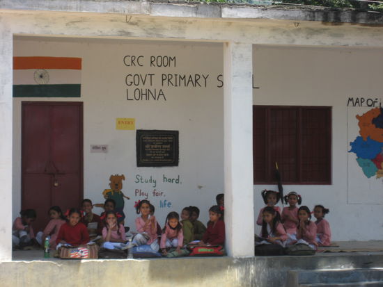 Students learning on the porch